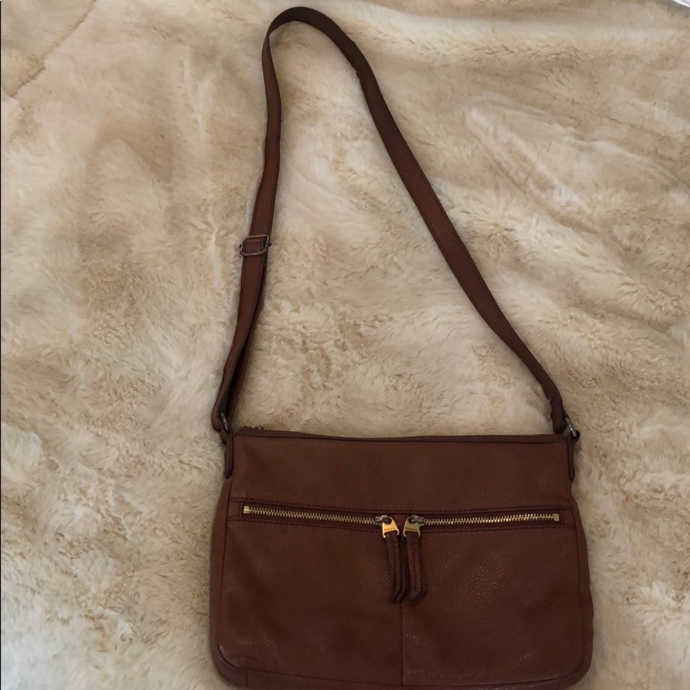 Brown across the shoulder bag with gold zippers